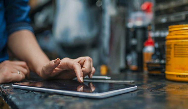 Person using mobile device at work