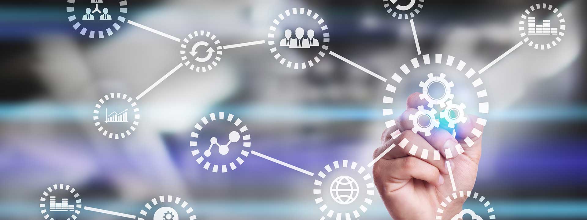 Image of a hand using a touch screen filed with innovation icons